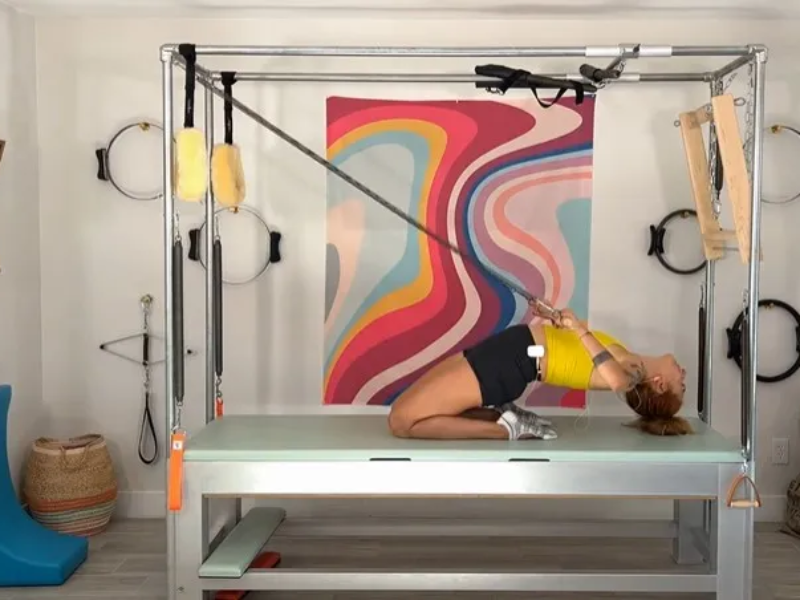 Bài tập Pilates - Rolling In And Out With Roll Back Bar