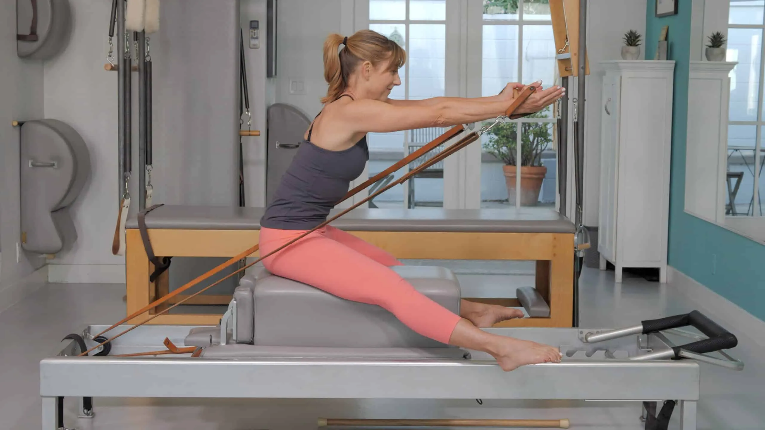 bai-tap-pilates-horseback-tren-reformer-2