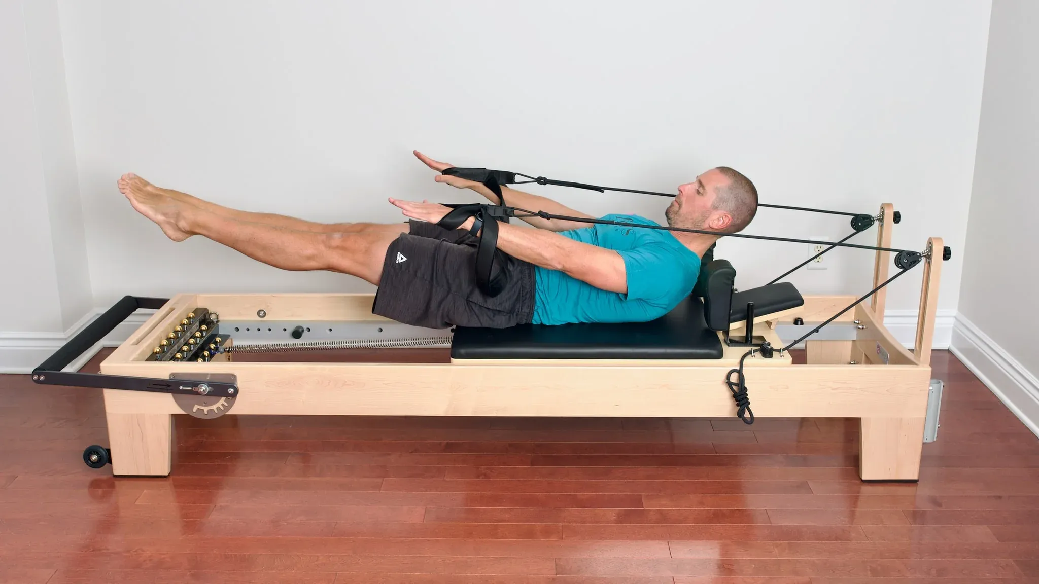 bai-tap-pilates-hundred-tren-reformer-2