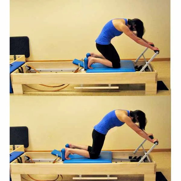 bai-tap-pilates-knee-stretches-round-back-tren-reformer-3