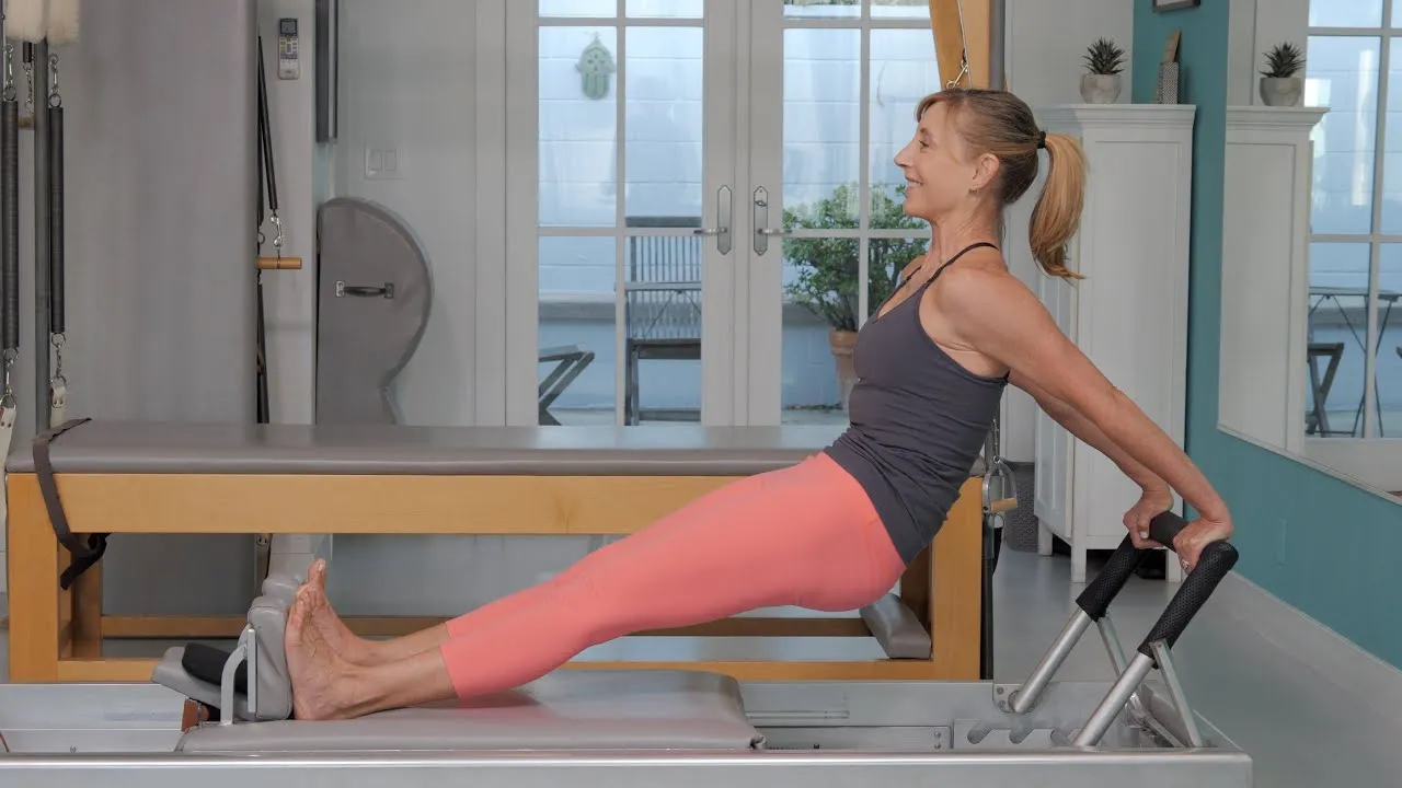 bai-tap-pilates-long-back-stretch-tren-reformer-3