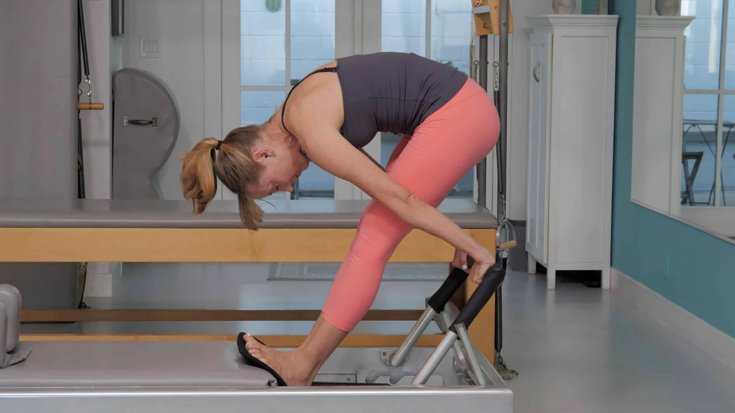 bai-tap-pilates-tendon-stretch-tren-reformer-2