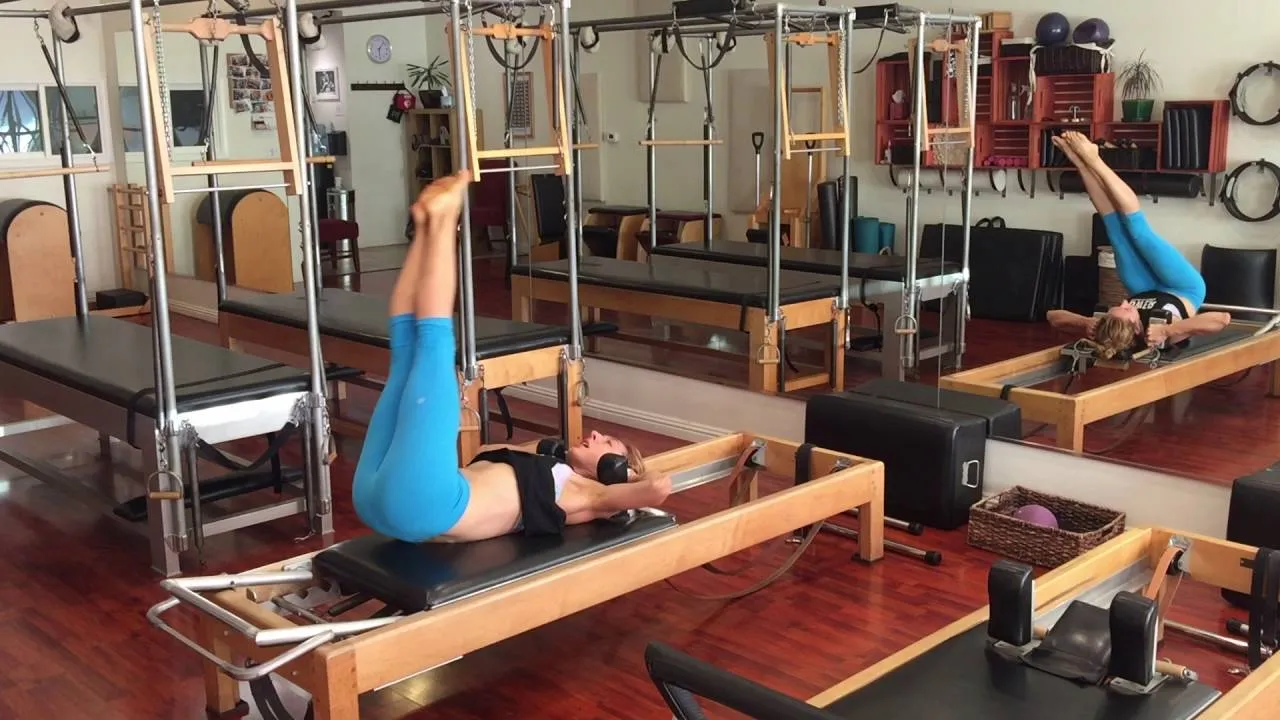 bai-tap-pilates-corkscrew-tren-reformer-2