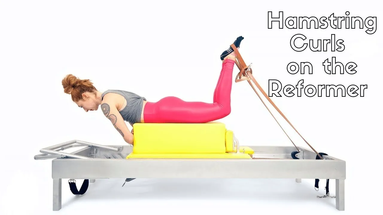 bai-tap-pilates-hamstring-curls-tren-reformer