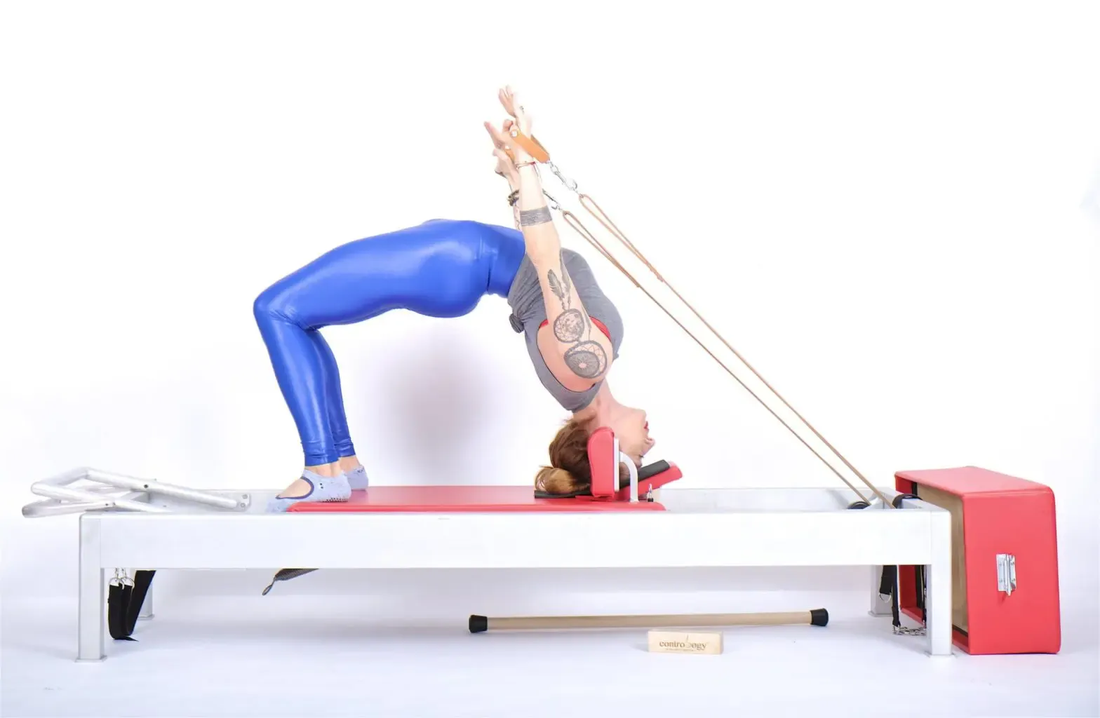 bai-tap-pilates-headstand-with-straps-tren-reformer-2