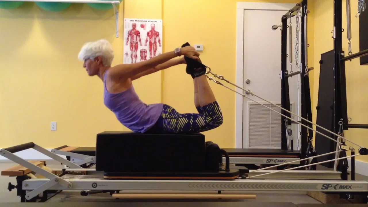 bai-tap-pilates-rocking-tren-reformer-3