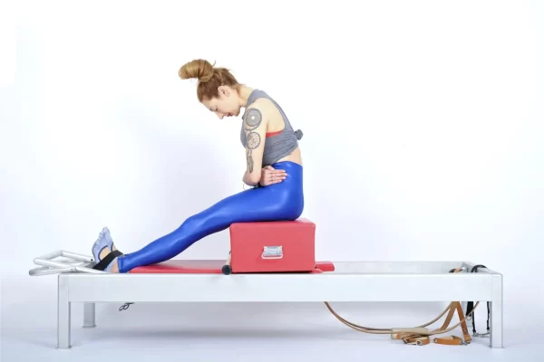 bai-tap-pilates-round-back-tren-reformer-1