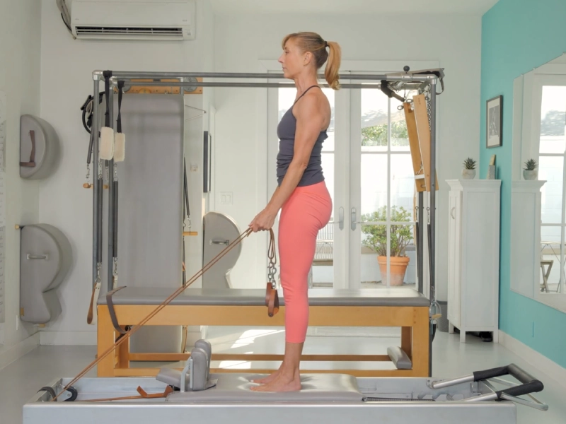 Hướng dẫn chi tiết cách thực hiện Russian Squats trên Reformer