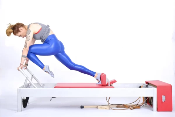 bai-tap-pilates-single-leg-knees-off-tren-reformer-1