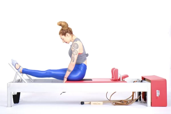 bai-tap-pilates-stomach-massage-round-back-tren-reformer-1