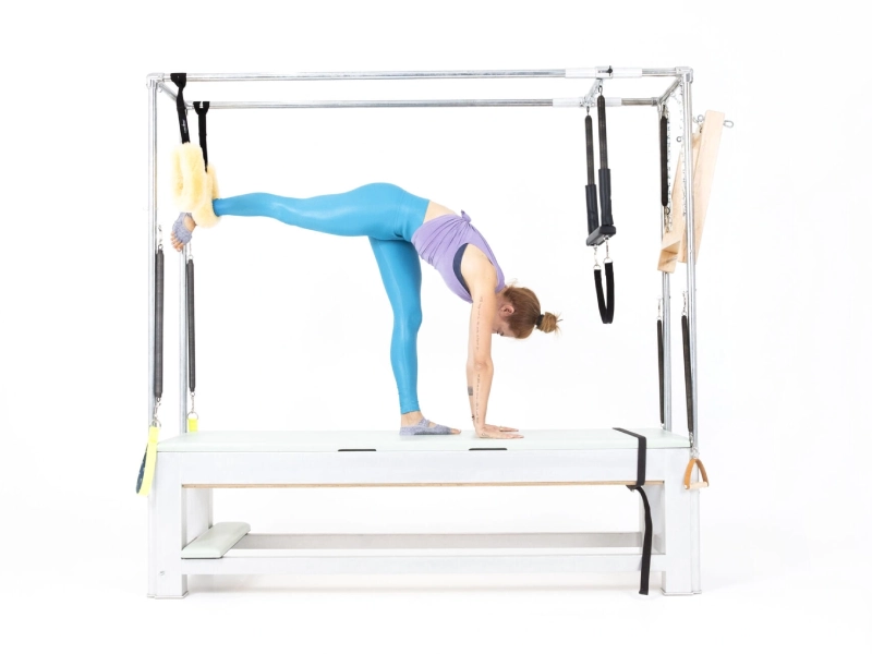 Lợi ích của bài tập Ballet Stretches Back trên Cadillac.