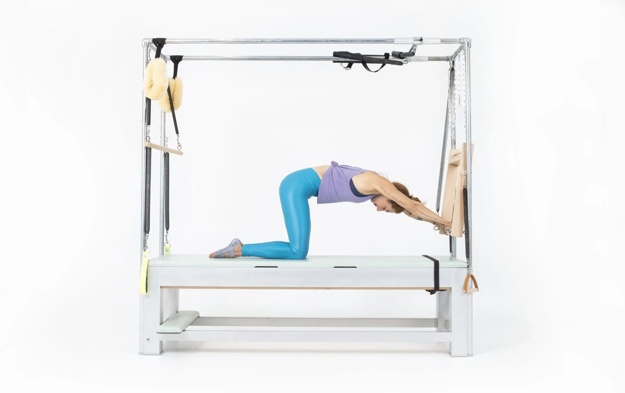 bai-tap-pilates-kneeling-push-thru-tren-cadillac-2