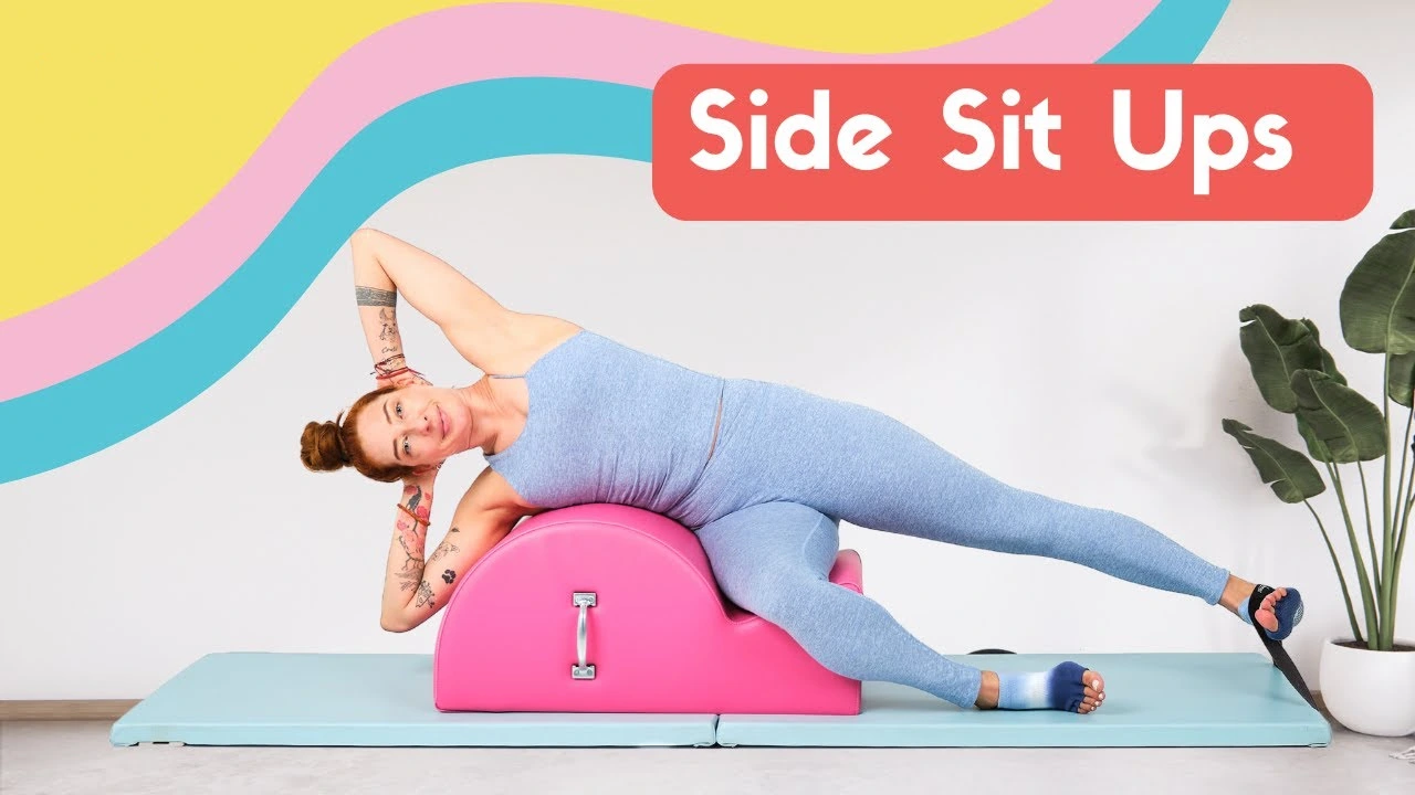 bai-tap-pilates-side-sit-ups-tren-spine-corrector