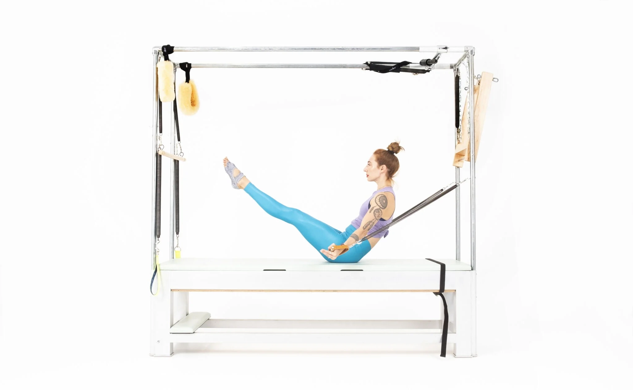 bai-tap-pilates-teaser-with-arm-springs-tren-cadillac-2