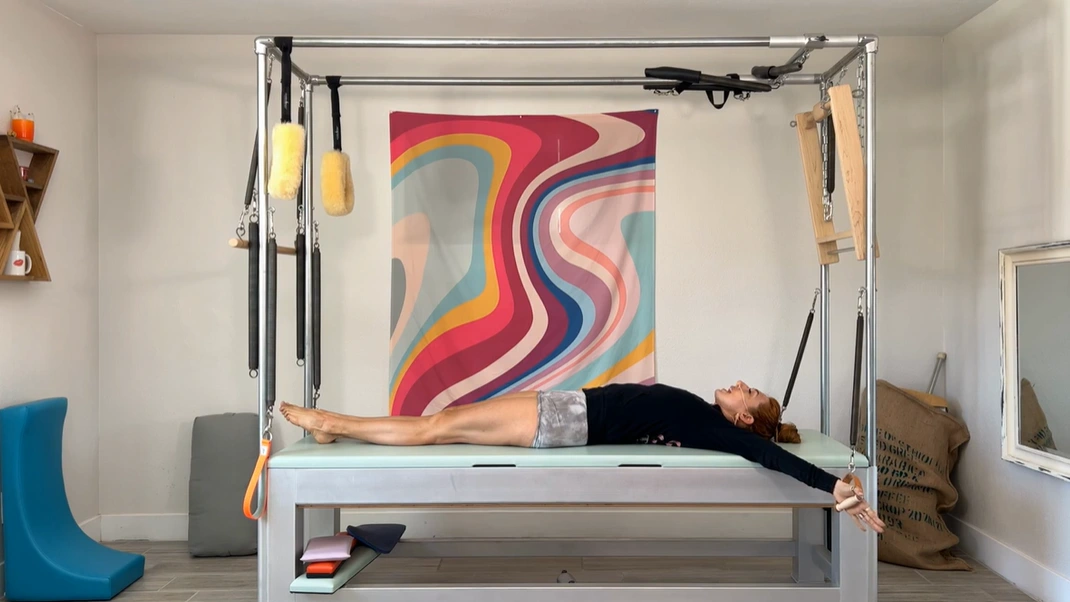 bai-tap-pilates-teaser-with-arm-springs-tren-cadillac-3