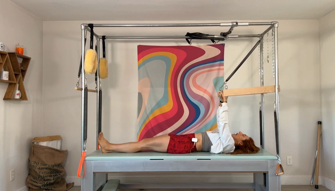 bai-tap-pilates-teaser-with-push-thru-bar-tren-cadillac-3