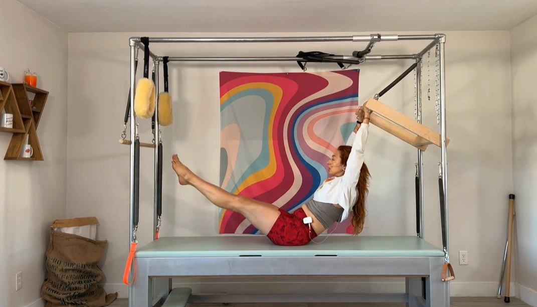 bai-tap-pilates-teaser-with-push-thru-bar-tren-cadillac-4