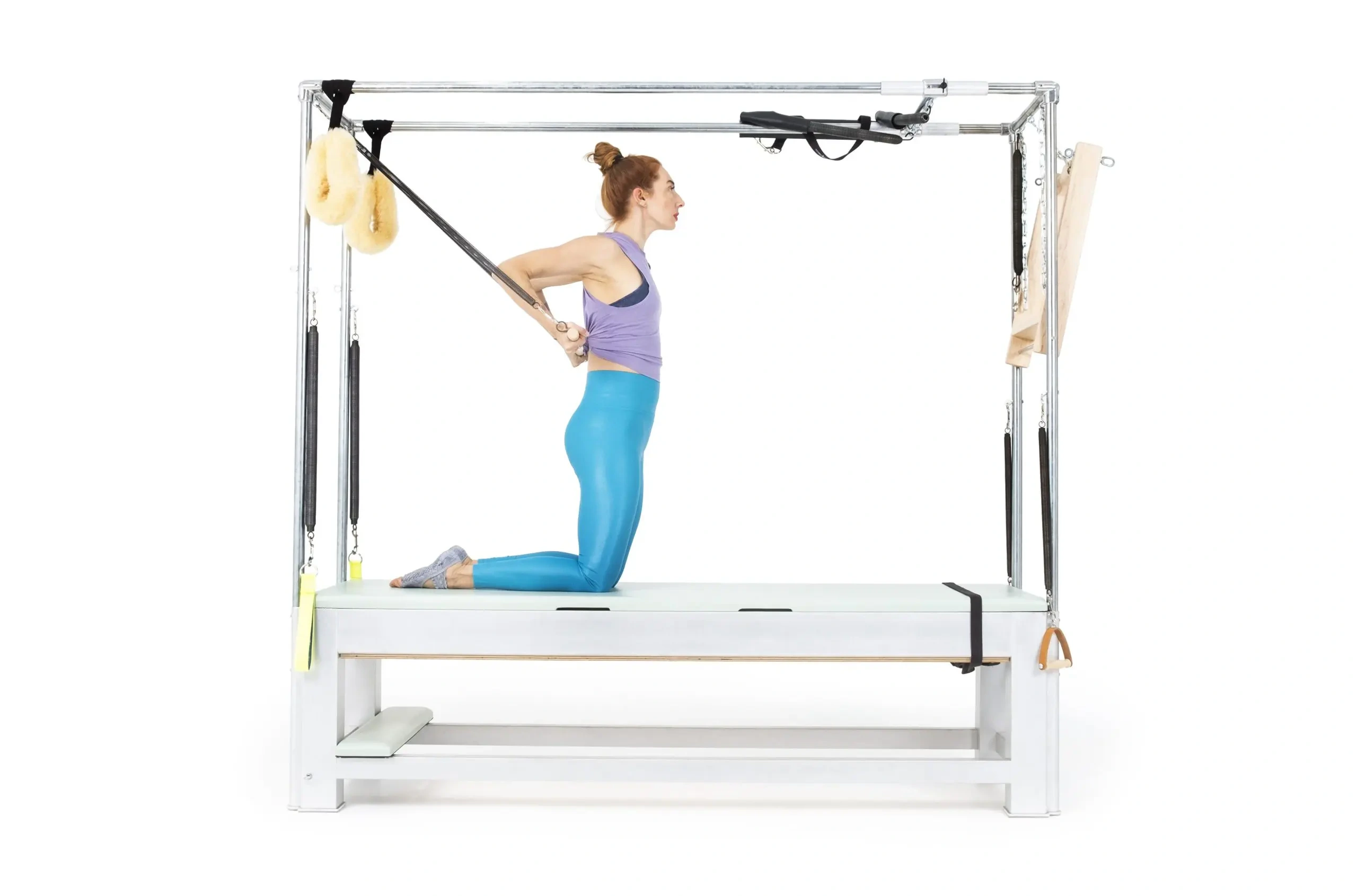 bai-tap-pilates-kneeling-long-back-arms-tren-cadillac-1