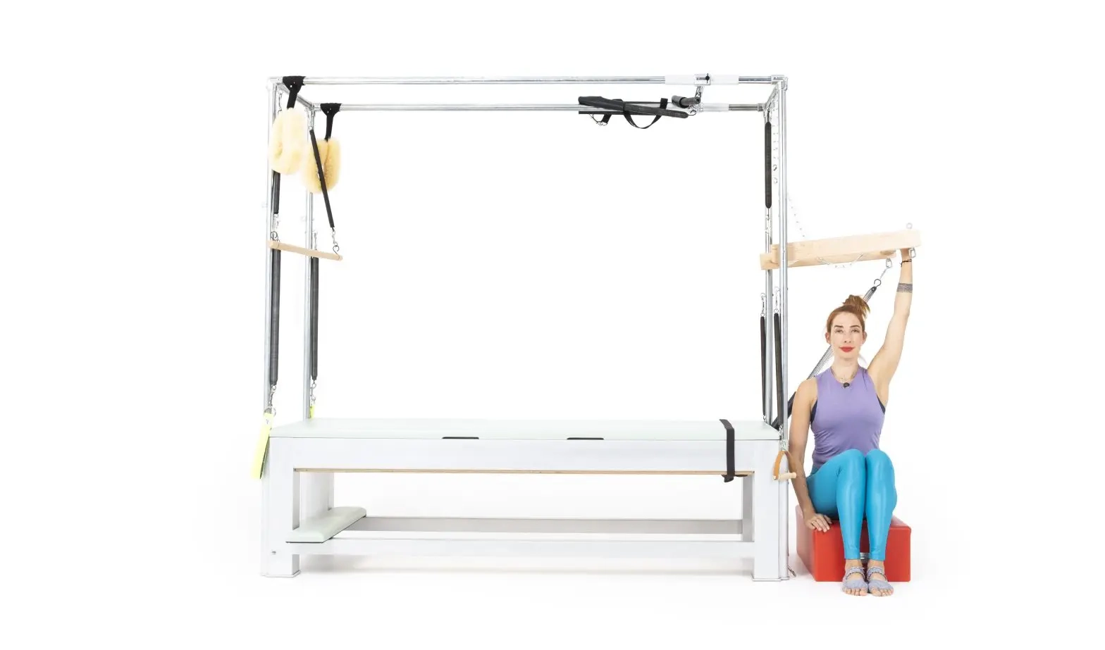 bai-tap-pilates-seated-push-thru-side-tren-cadillac-1