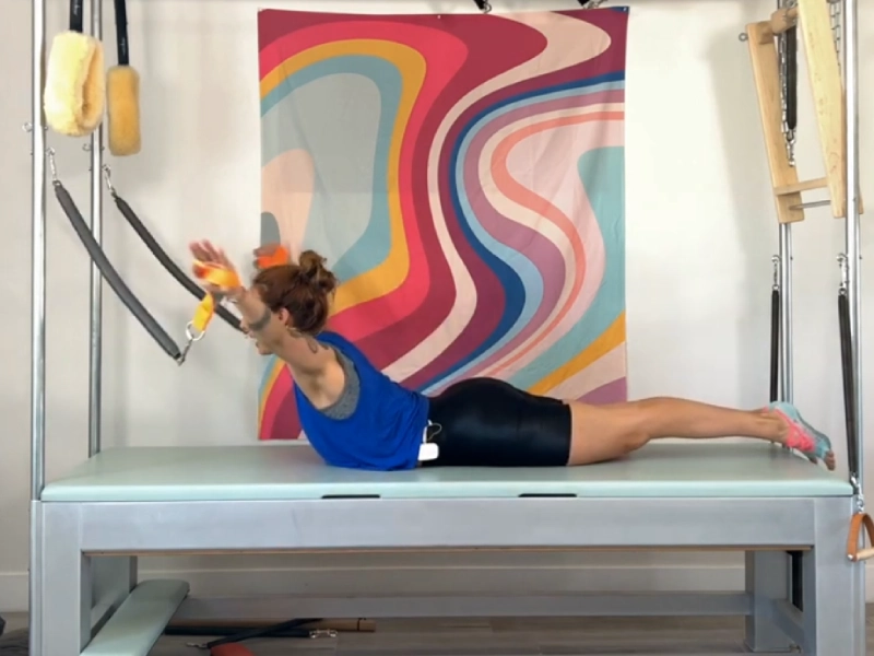 Bài tập Pilates Flying Eagle trên Cadillac
