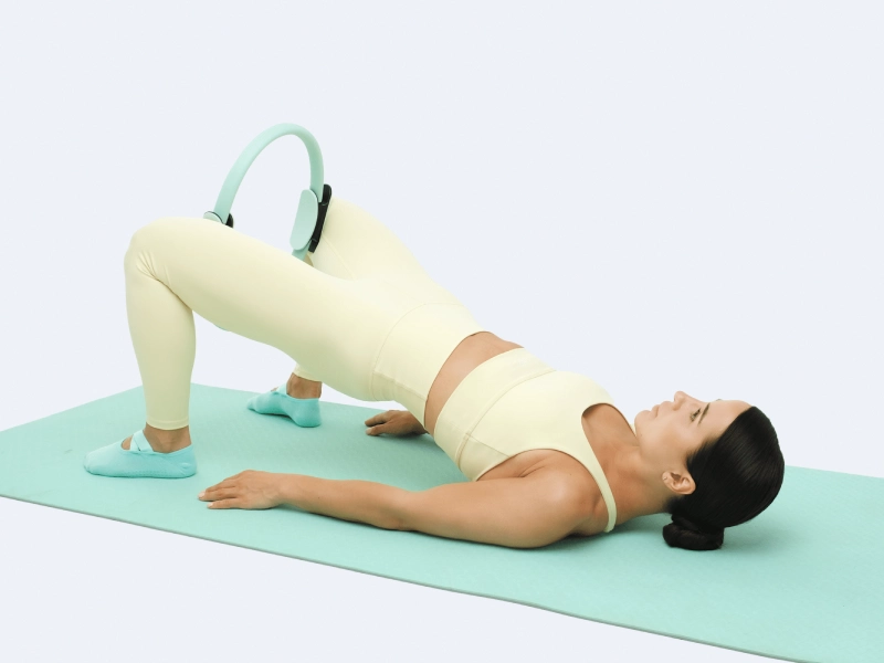 Bài tập Pilates cho phần thân dưới - Bài tập Cầu.