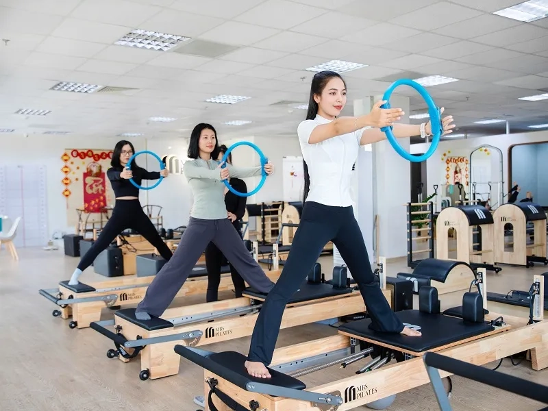 The Pilates ring helps the practitioner adjust and maintain correct posture throughout the exercise.