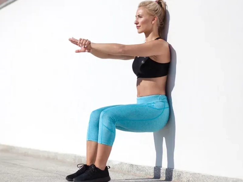 Wall Squat Exercise.