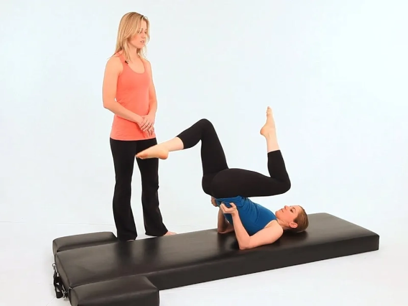 How to perform Pilates cycling exercises.
