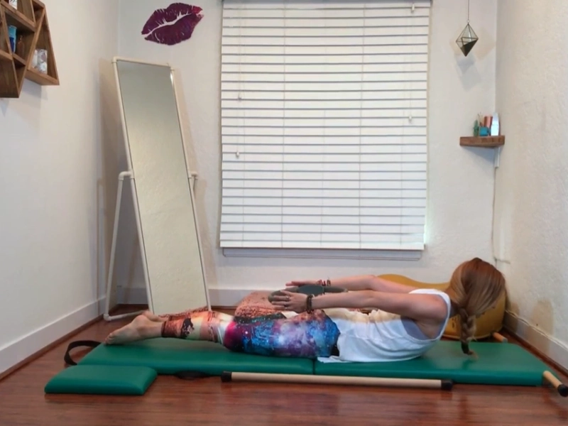 Perform Pilates Double Leg Kick with a Magic Circle