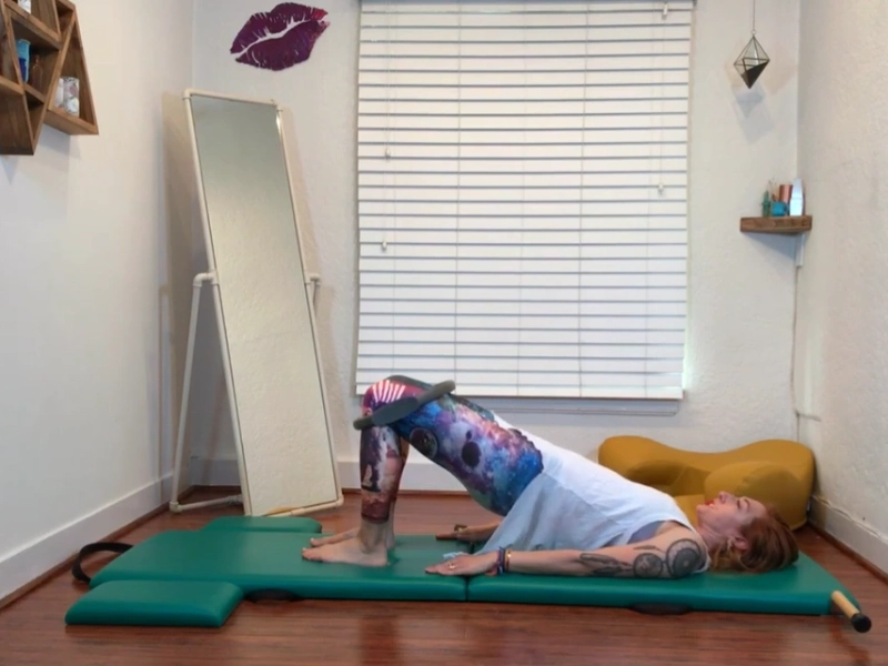 Pilates Shoulder Bridge with Magic Circle.