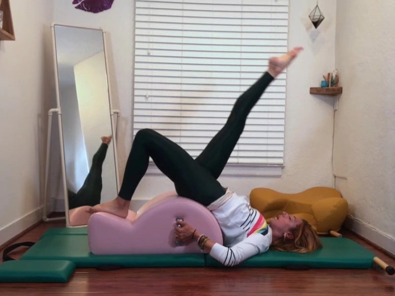 Pilates Shoulder Bridge on the Spine Corrector.