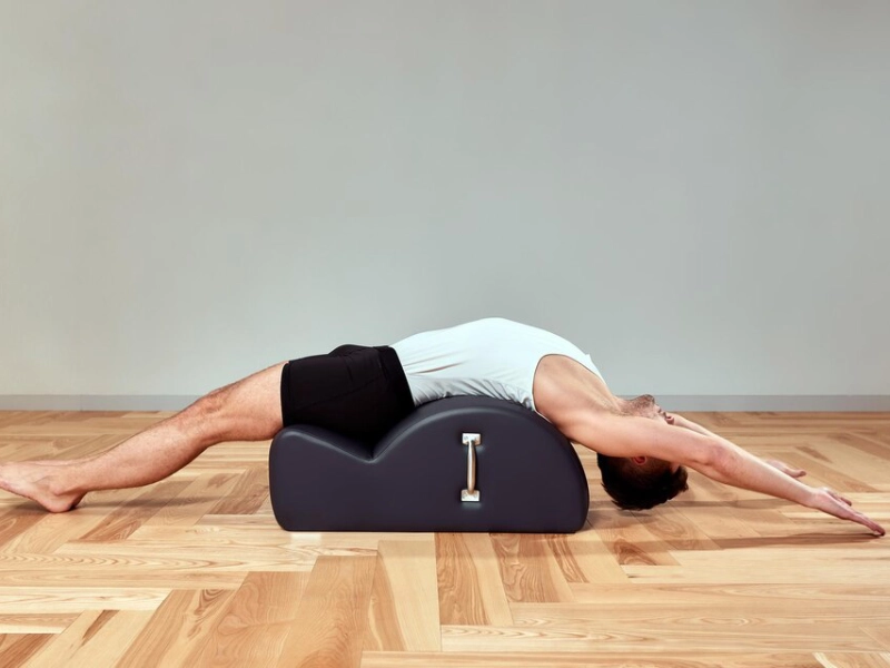 Pilates Spine Corrector helps improve posture and spinal health.
