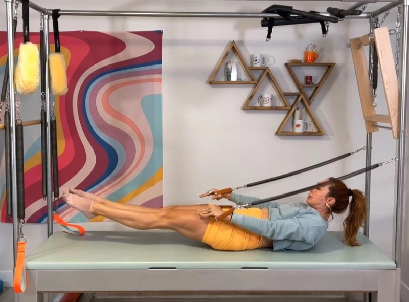 How to perform Pilates Backstroke on a Cadillac