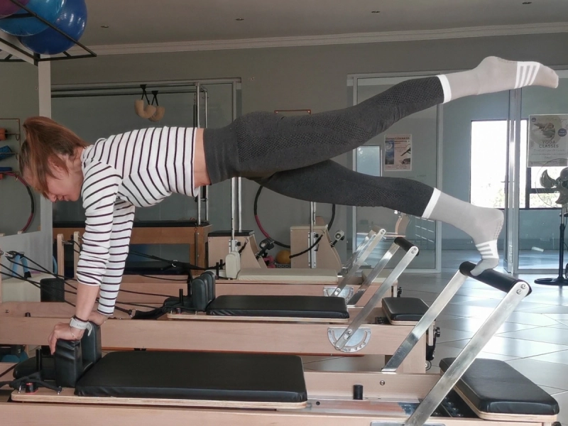 Benefits of the Control Push Ups Front exercise on the Reformer machine.