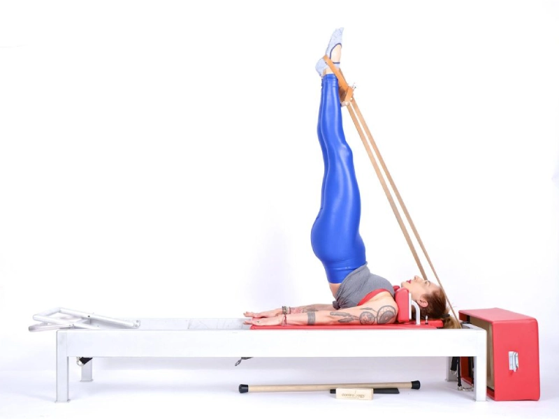 Pilates High Frogs exercise on the Reformer