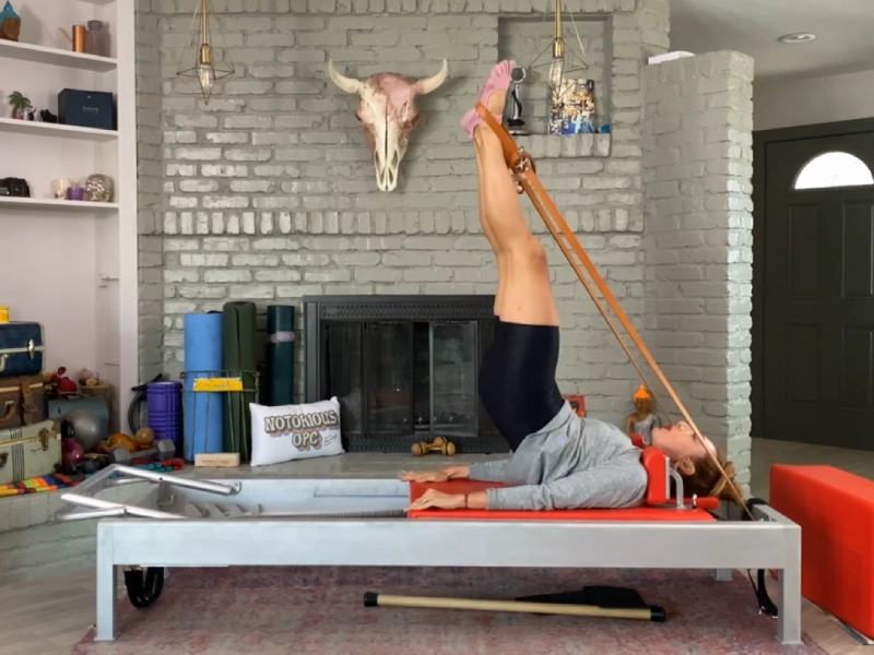 Detailed instructions on how to perform the High Frogs exercise on the Reformer machine.