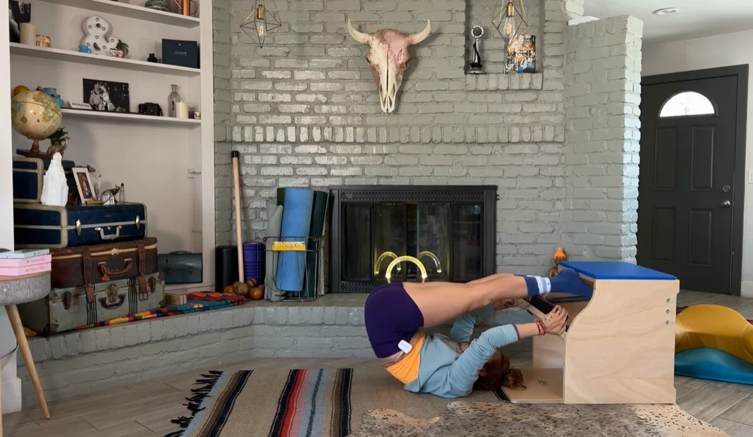 Pilates Jackknife exercise on Wunda Chair.