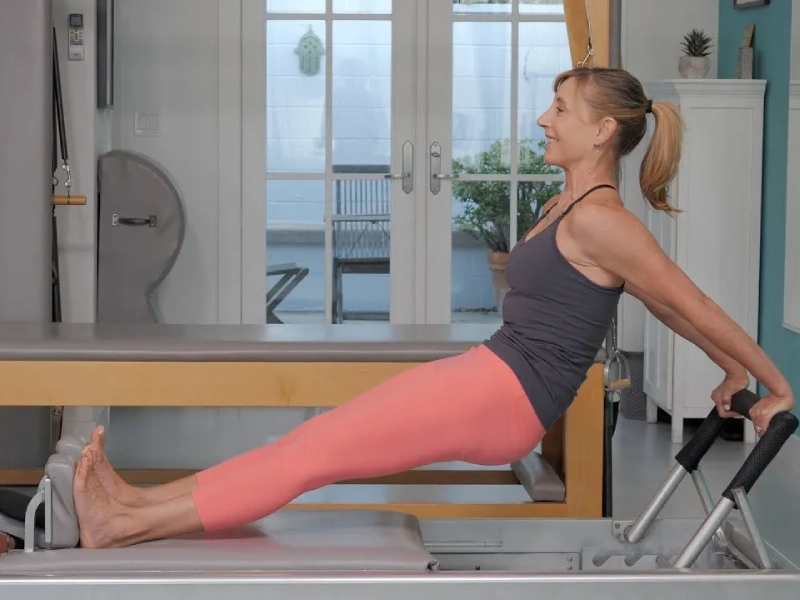 Tips and things to keep in mind when performing the Pilates Long Back Stretch exercise.