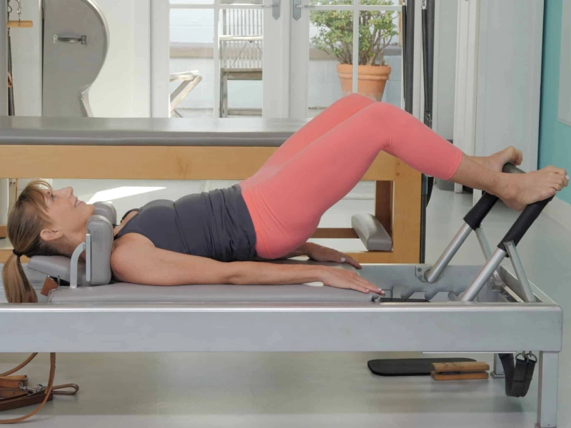 The Pilates Pelvic Lift exercise on the Reformer offers many benefits to practitioners.