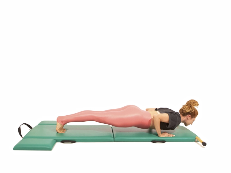 The benefits of the Pilates Push Up pose.