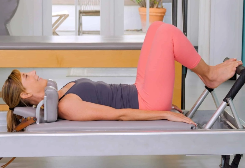 Footwork exercises on the Reformer offer many benefits to the body when practiced regularly.