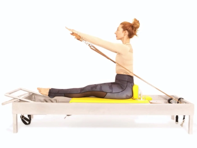Pilates Rowing Exercise on the Reformer.