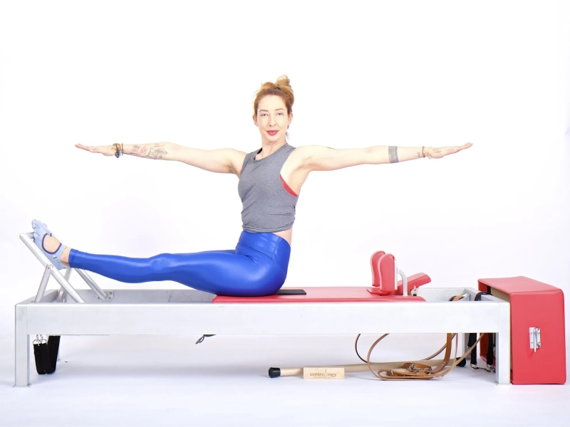 Benefits of the Pilates Stomach Massage Twist exercise on a Reformer.