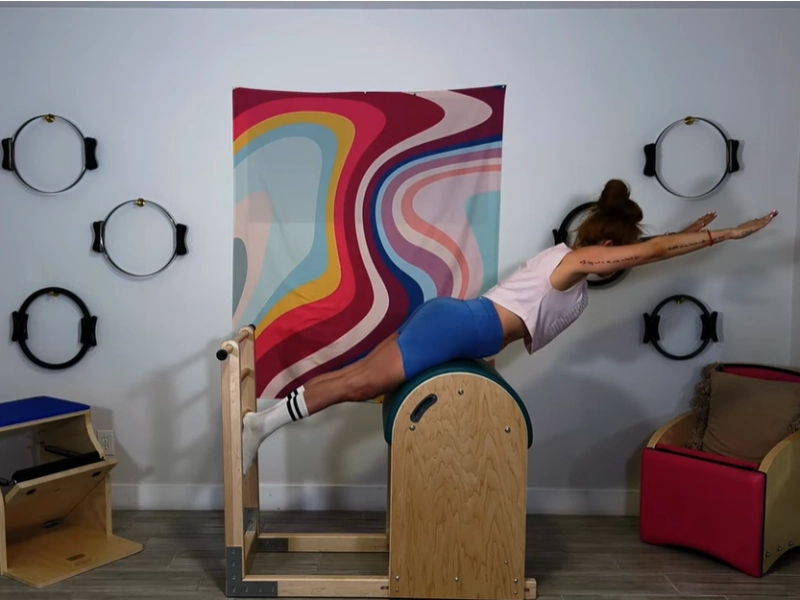 Pilates Swan pose on Ladder Barrel