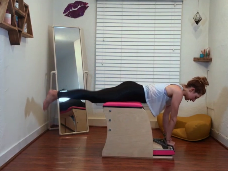 Perform Pilates Swan on the Wunda Chair