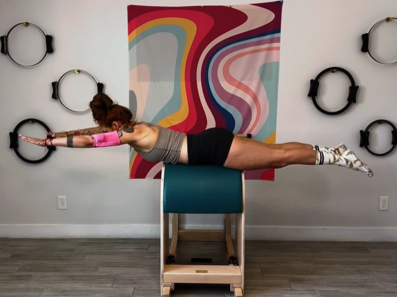 Pilates Swimming Exercise on Ladder Barrel