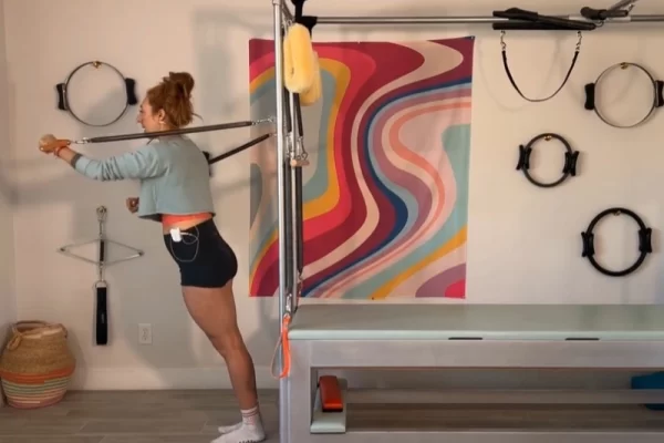 Pilates Boxing with Standing Arm Springs on the Cadillac.