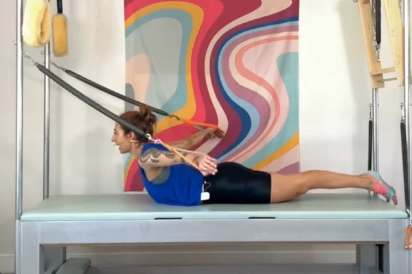 erform the Pilates Flying Eagle Exercise on the Cadillac.