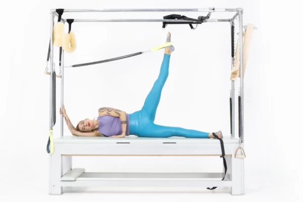 Pilates Side Leg Springs exercise on the Cadillac.