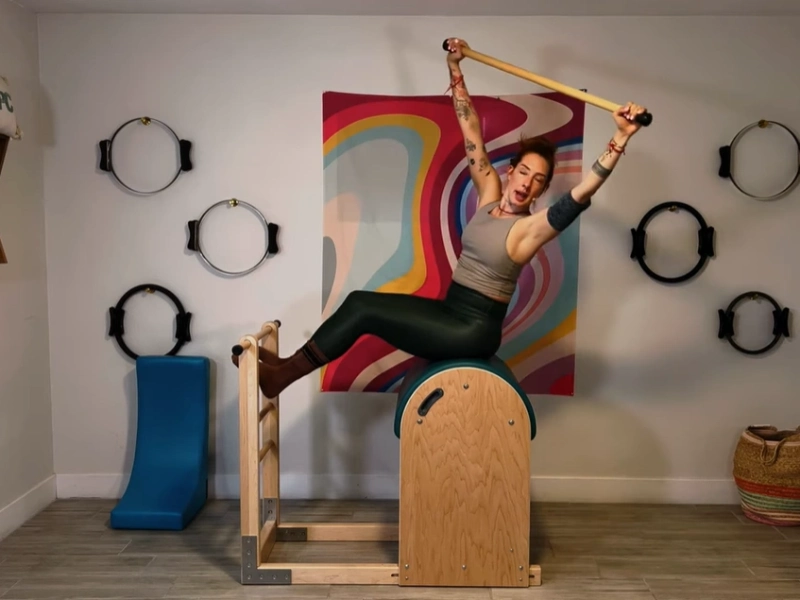 Perform the Around the World exercise on the Ladder Barrel.